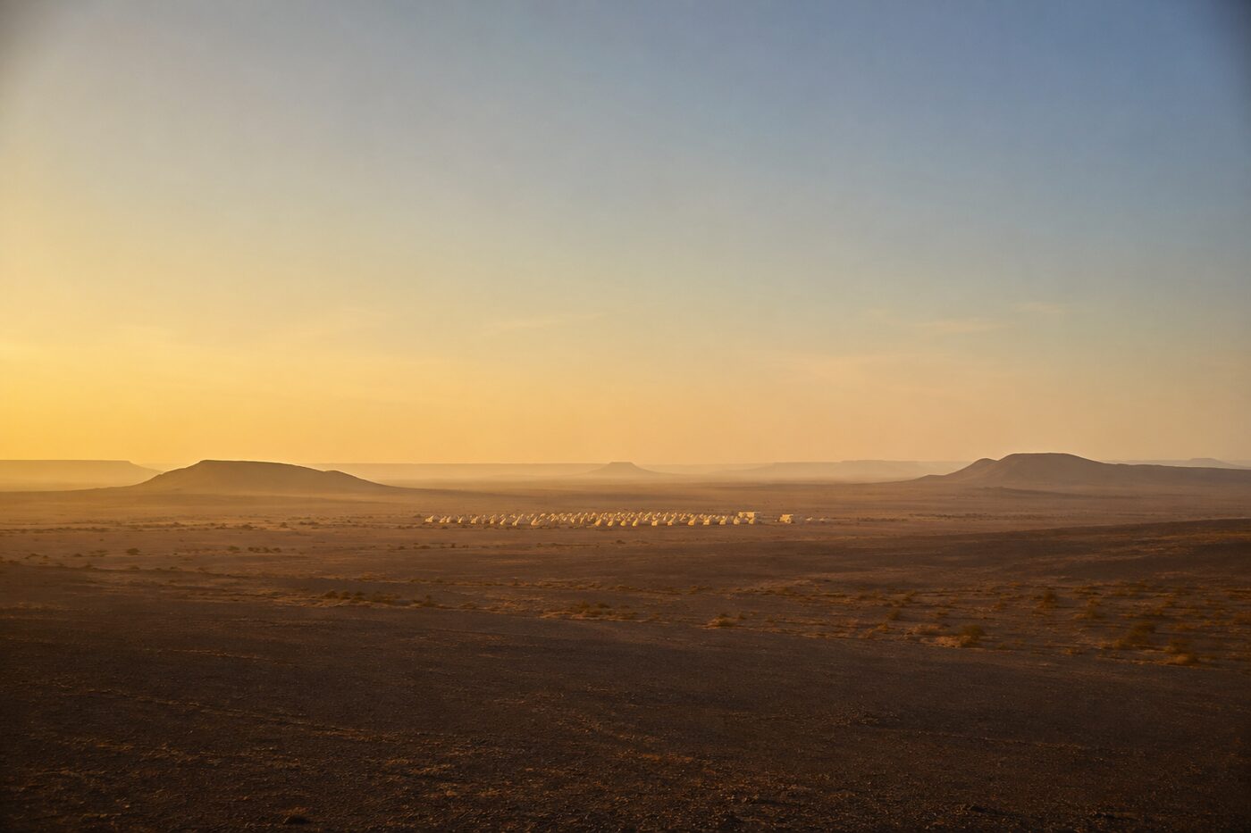 A wide desert plain at first light